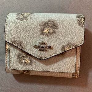 Adorable spring and summer coach wallet.